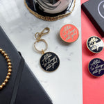 Load image into Gallery viewer, New Gold Plated Hard Enamel Black Keyring - Allah is Always With You by Safar London

