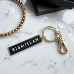 Load image into Gallery viewer, New Bismillah Gold Plated Hard Enamel Black Keyring by Safar London
