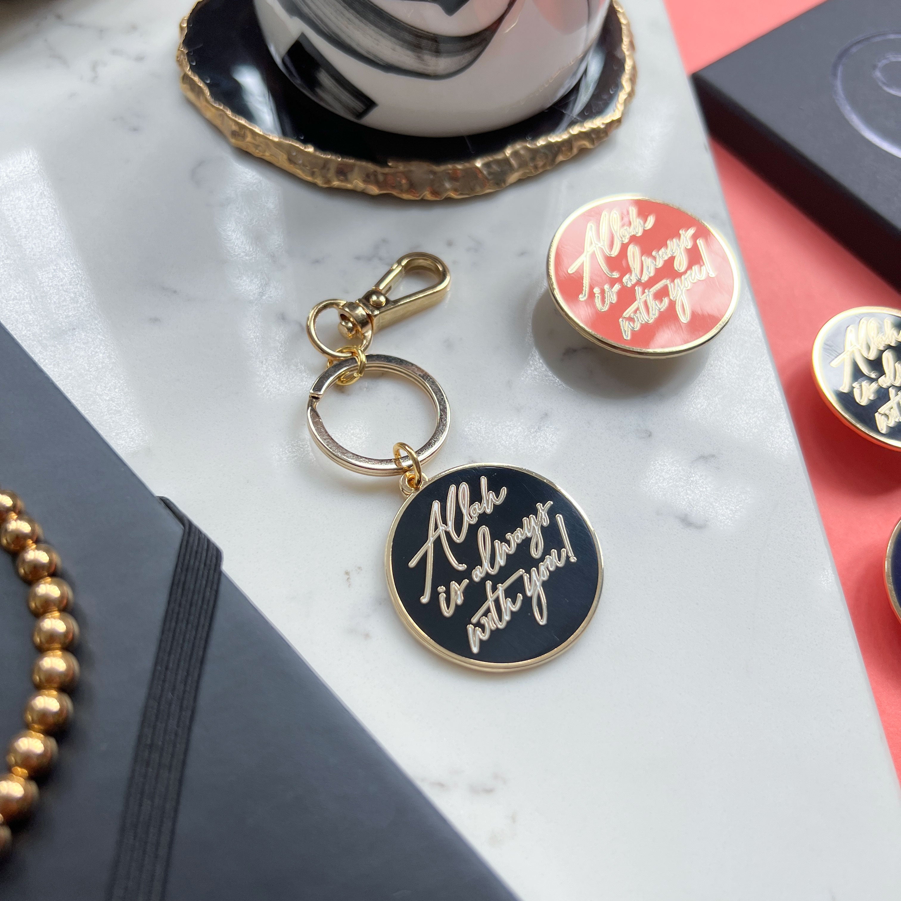 New Gold Plated Hard Enamel Black Keyring - Allah is Always With You by Safar London