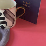Load and play video in Gallery viewer, Al-Hub Calligraphy Mug, Hijab &amp; Hub Heart Pin Gift Set
