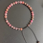 Load and play video in Gallery viewer, NEW 33 Bead Tasbih Bracelet Pink Rhodonite Stone by Safar London
