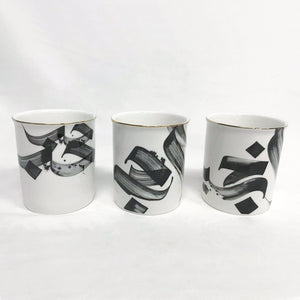 Ceramic pen pot with gold rim by Safar London