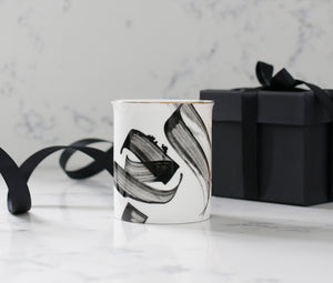Ceramic pen pot with gold rim by Safar London
