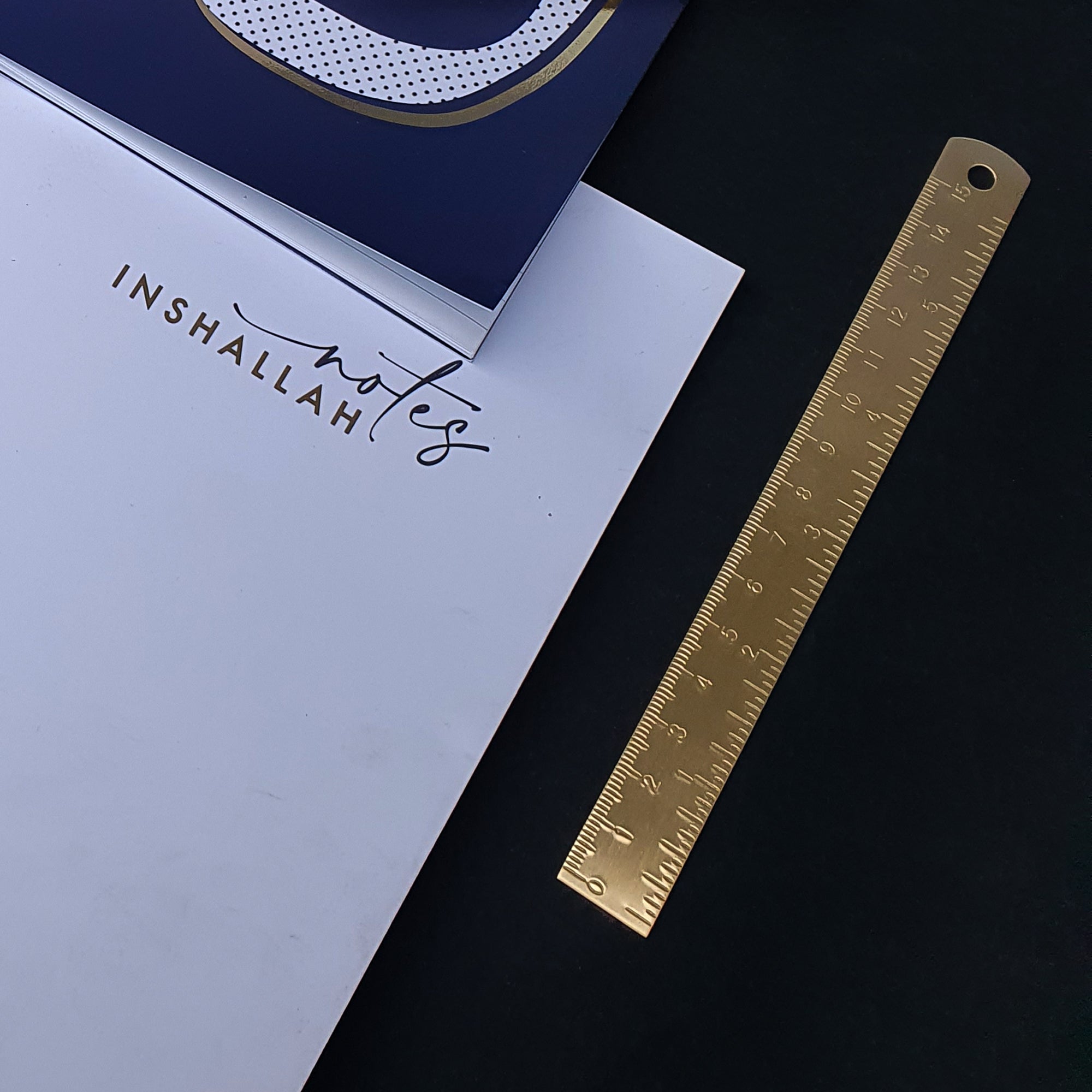 Gold metal ruler by Safar London