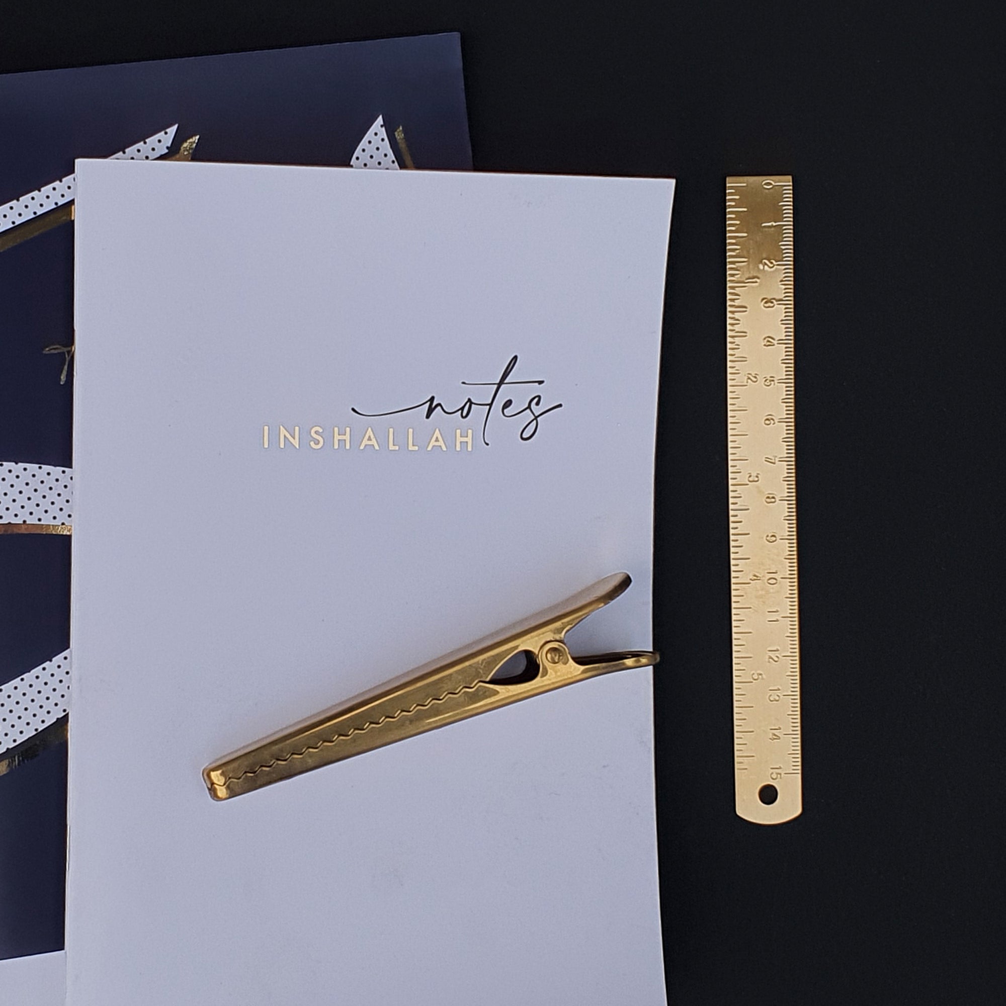 Gold metal ruler by Safar London