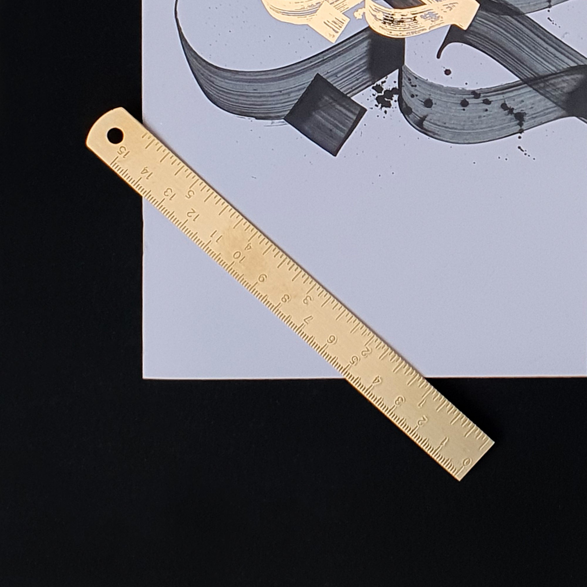 Gold metal ruler by Safar London