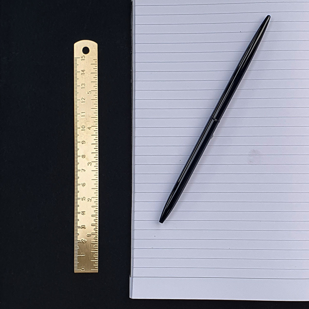 Gold metal ruler by Safar London