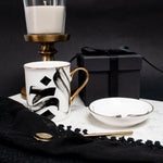 Load image into Gallery viewer, Al-Khabir Calligraphy Mug with gold handle and rim by Safar London
