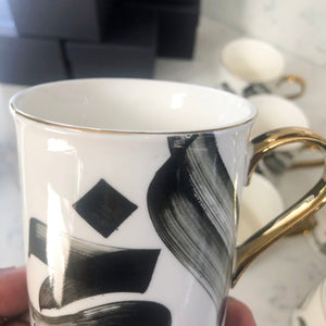 SECONDS Calligraphy Mug with gold handle and rim by Safar London