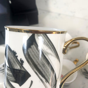SECONDS Calligraphy Mug with gold handle and rim by Safar London
