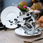 Load image into Gallery viewer, Tea Cup and Saucer Arabic Calligraphy design in Giftbox
